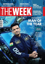 Magazine cover featuring a person in a space suit with text about 'Man of the Year' on a blue and red background.